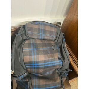 Billabong blue and brown plaid backpack.